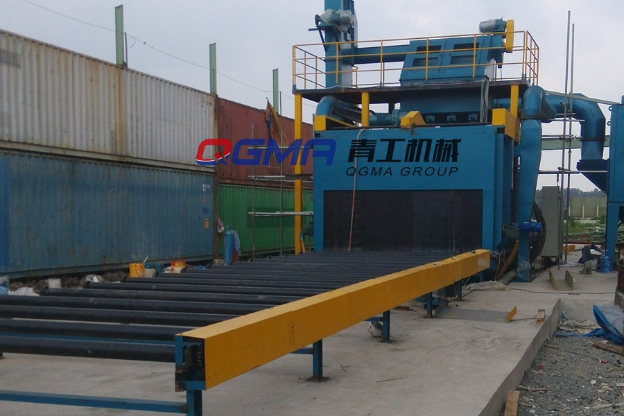 蹊径护栏通过式抛丸整理机的事情原理